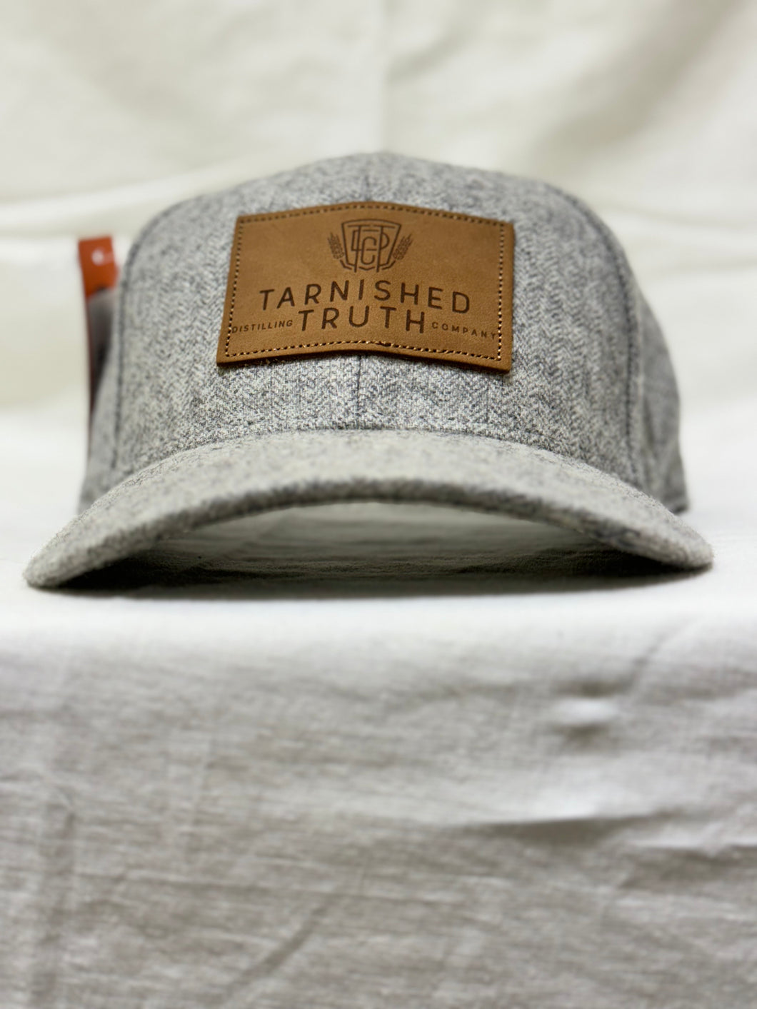 Tarnished Truth Hat- wool leather patch
